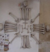 Yes.. those are human bones forming the Jesuit logo!